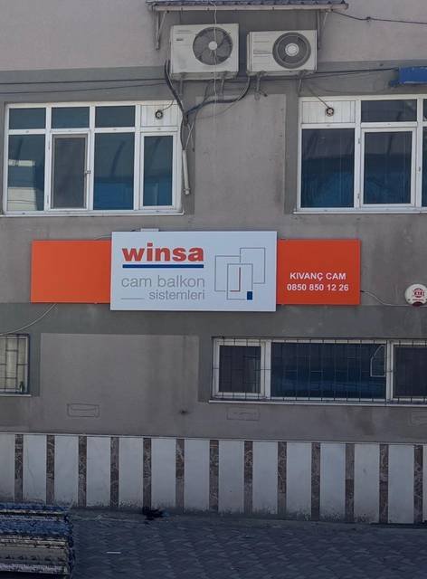 Winsa — Apartman cephe tabelası